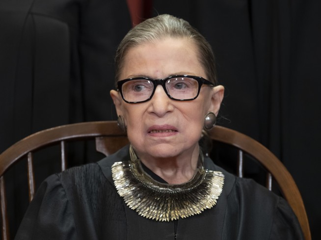 Ginsburg returns to Supreme Court bench in public session