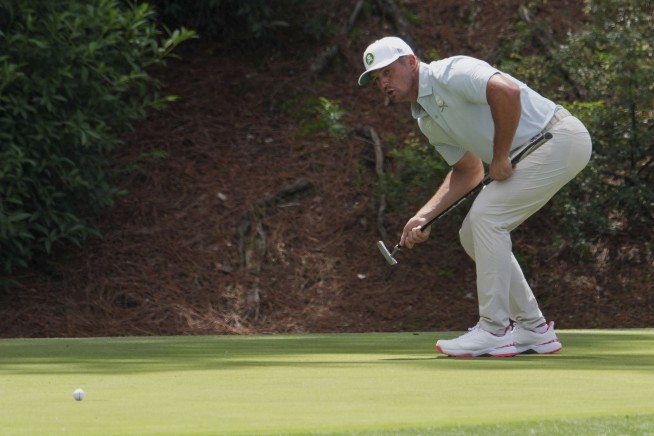Justin Rose stays in the Masters lead with some all-star company