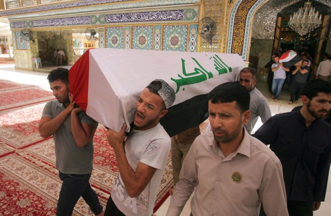 Iraqi officials: 91 people killed in 2 bombings in Baghdad