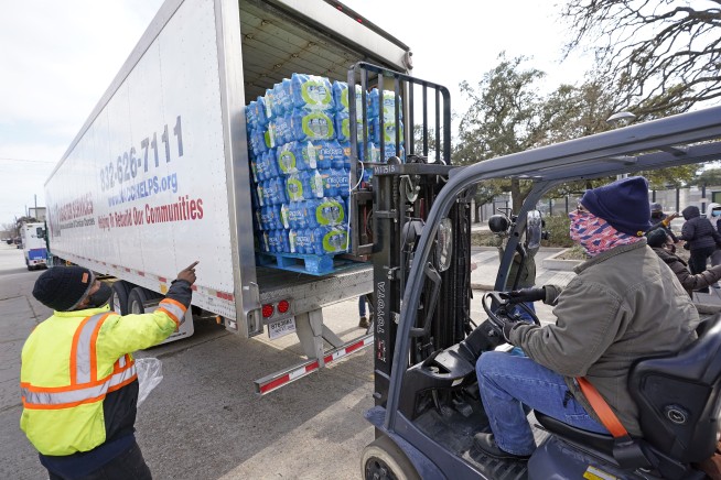 Lights come back on in Texas as water woes rise in the South