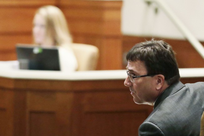 The Latest: Grandfather: Suspect 'backed off from crowds'