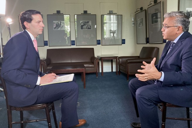 The AP Interview: US 'vulnerable' to COVID without new shots