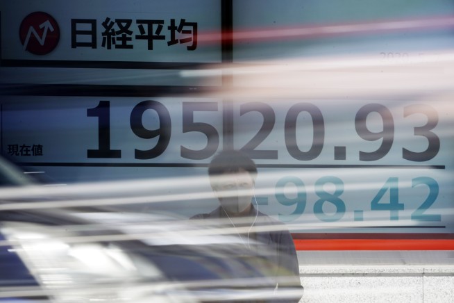 Wall Street rallies on hopes for slowing economic pain