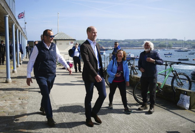 Prince William says Kate's 'doing well,' in rare comments since she announced her cancer diagnosis