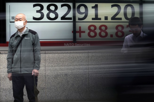 Stock market today: Asian shares mixed after Wall Street's lull stretches to a 2nd day