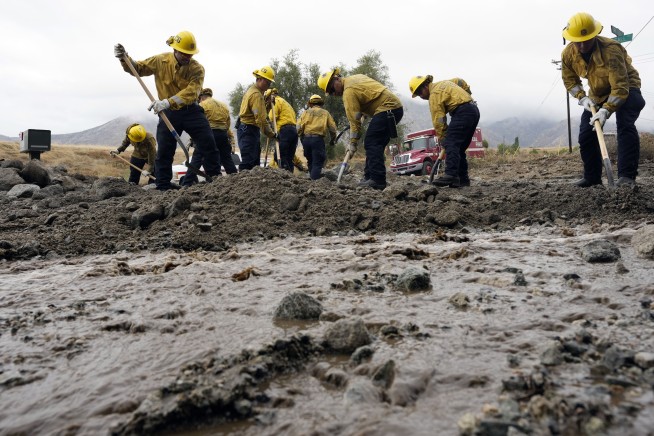 California mountain and desert towns dig out of the mud tropical storm