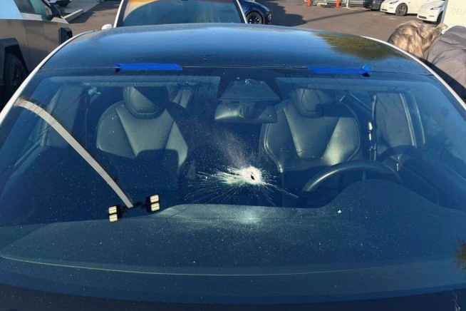Oregon police investigate nighttime gunshots that shattered windows at a Tesla dealership
