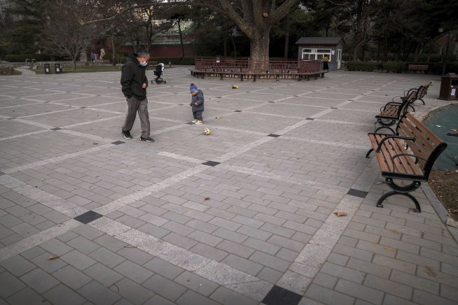 China vows to drop some travel tracking in COVID rule easing