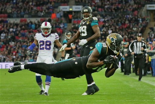 Jaguars hold on to beat Bills 34-31 in London