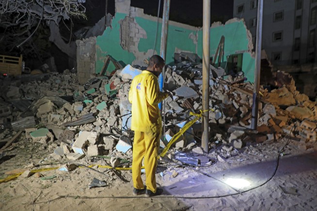 Death toll in bombing in Somalia's capital rises to 20