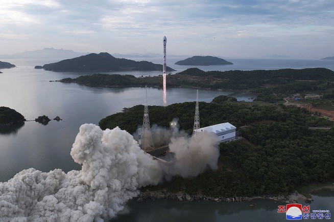 North Korea says it put a military spy satellite into orbit on third try