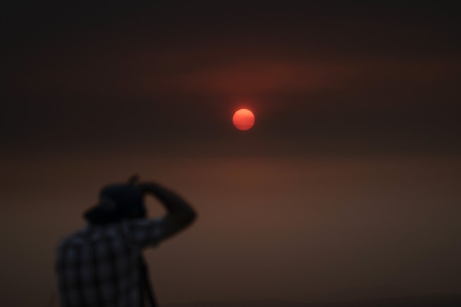 The Latest: California wildfire largest on state record