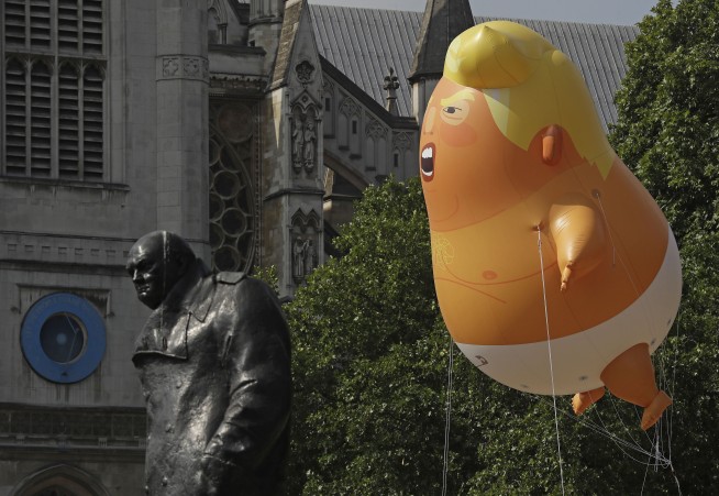 The Latest: Baby Donald blimp flies over London amid protest