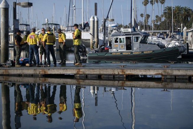 Family, teenagers among 34 presumed dead in boat fire