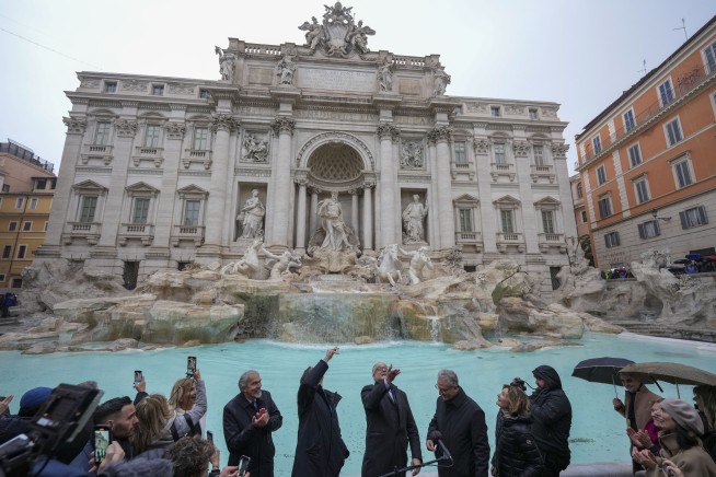 Rome's iconic Trevi Fountain reopens after renovation work in time for the Jubilee Holy Year