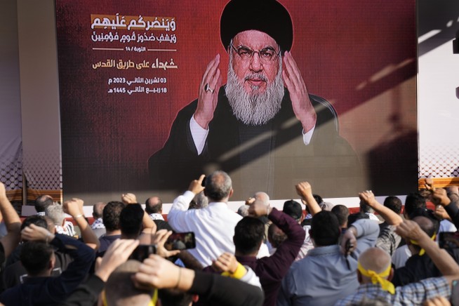 Lebanon's militant Hezbollah leader threatens escalation with Israel as its war with Hamas rages on