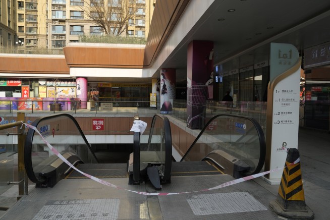 China Evergrande is ordered to liquidate, with over $300 billion in debt. Here's what that means.