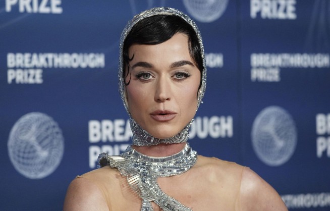 Ahead of spaceflight, Katy Perry is reading Carl Sagan and channeling her 'feminine divine'
