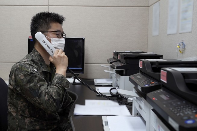 Koreas talk on hotline restored after North's missile tests