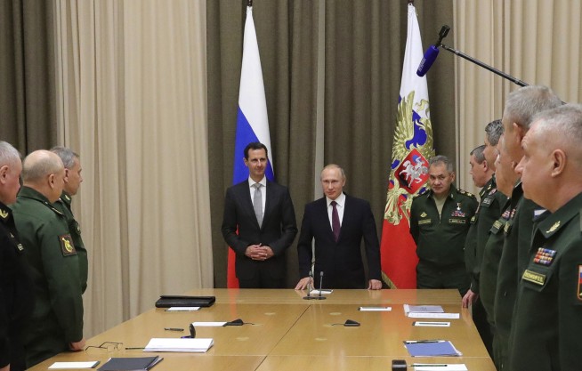 Syria's Assad travels to Russia, meets with Putin