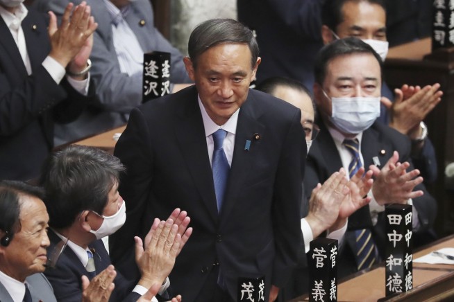 Japan's new PM Yoshihide Suga, self-made and strong-willed