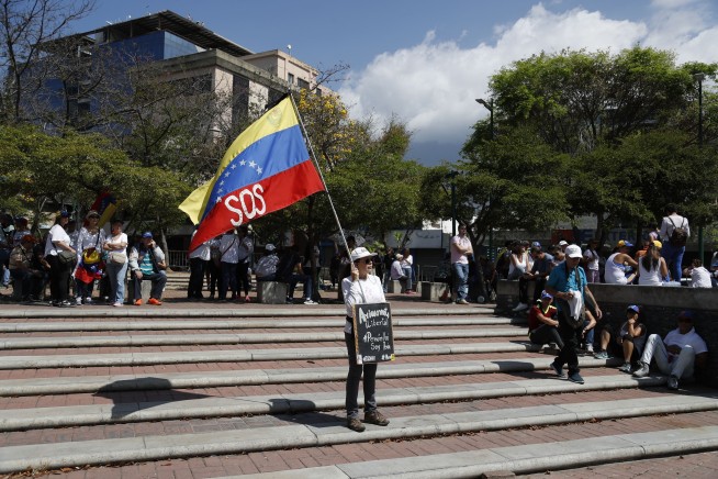 Guaido arrives in Venezuela as supporters gather to protest
