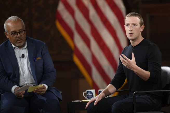 Facebook CEO promotes free speech; no questions from press