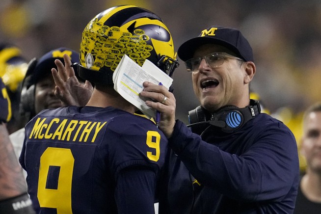 Michigan overpowers Washington 34-13 as Jim Harbaugh delivers a national title