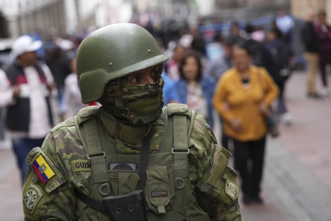 Armed men storm an Ecuador TV studio during a live broadcast as attacks in the country escalate