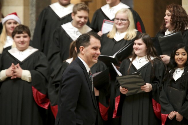 Walker shouted down over GOP attempt to weaken his successor