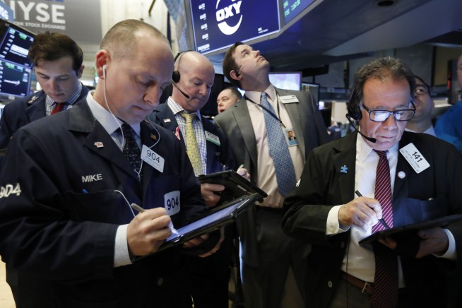 Markets Right Now: Stocks, yields drop on growth worries