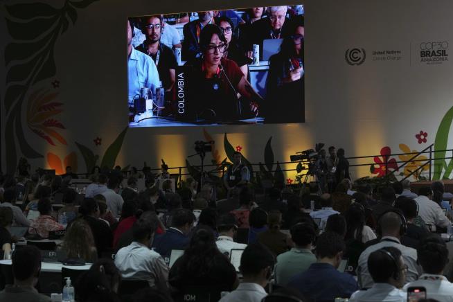 UN climate deal increases money to countries hit by climate change, but no explicit fossil fuel plan