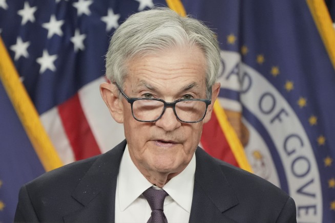 Federal Reserve leaves key rate unchanged as it sees risk of higher prices and higher unemployment
