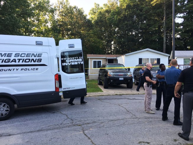 Mother charged with killing 4 of her kids and their father