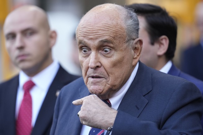 Defiant Giuliani says he's a victim of 'political persecution' as he's told again to give up assets