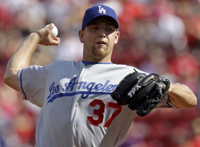 Ex-pro baseball player sought in woman's killing found dead