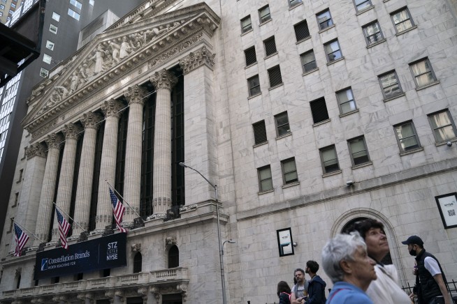 Wall Street ticks higher as recession watch remains murky