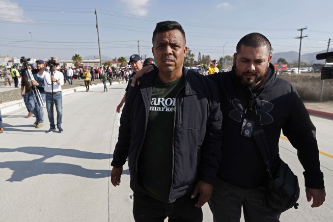 Group that escorts migrant caravans draws more scrutiny