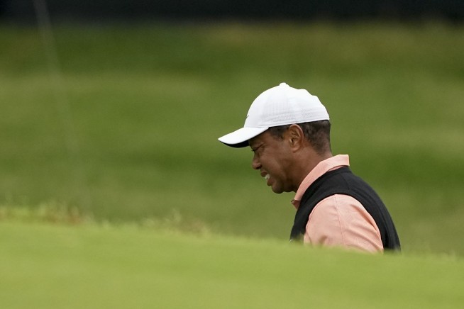 Struggle for Tiger at PGA and a putt at the end to break 80
