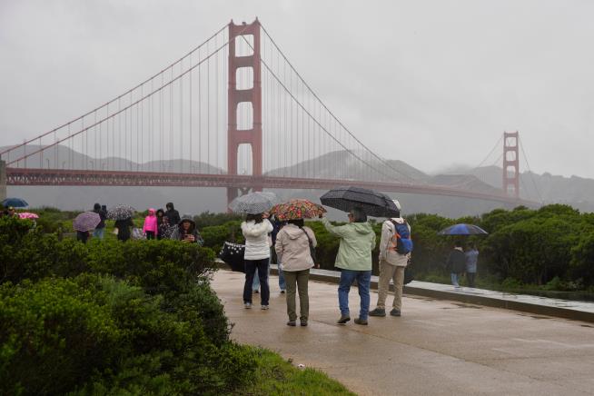 California walloped by winter storm with high winds and heavy rain and snow