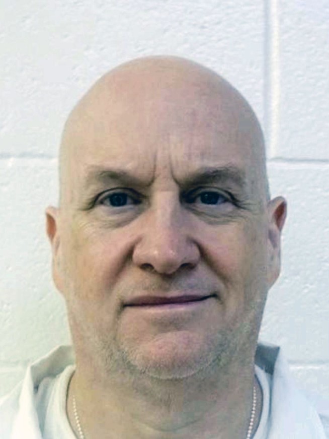 Former police chief, serving murder and rape sentences, escapes from Arkansas prison