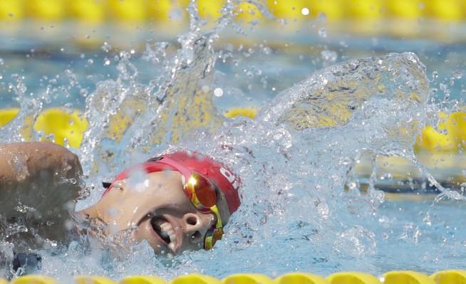 The Latest: US ends gold medal BMX drought with Fields win