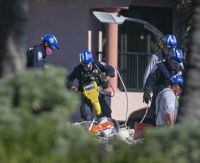 Crews nearly done drilling for Florida condo demolition