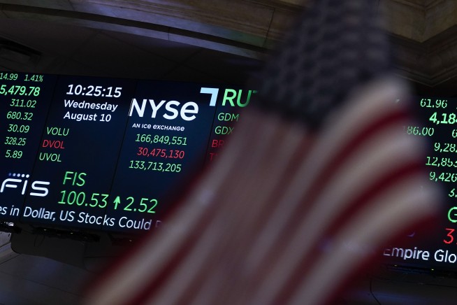 Stocks tumble after Fed dashes hopes for easing up on rates
