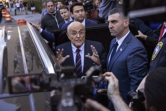 Rudy Giuliani has turned over his luxury watches and Mercedes in defamation case, lawyer says