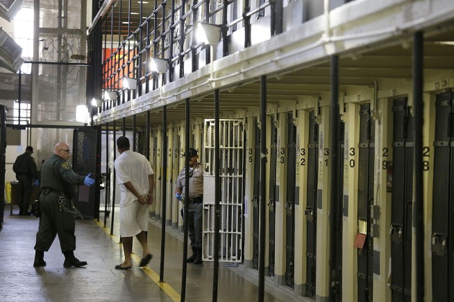 Court orders California to cut San Quentin inmates by half