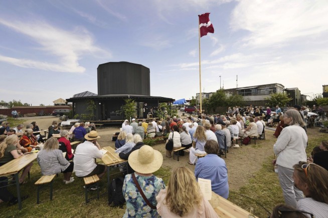 A tiny church in Denmark celebrates community and coziness within 12 walls — one for each apostle