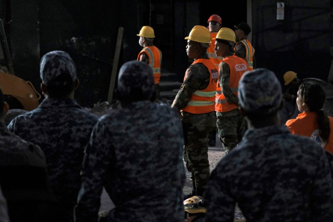 Officials scramble to identify victims of Dominican club roof collapse that killed at least 184