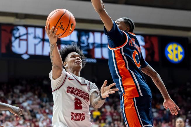 Alabama's Aden Holloway, the Tide's No. 2 scorer, is arrested on a felony drug charge