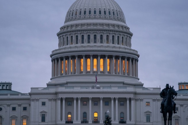 The Latest: House votes to add $5B to bill for border wall